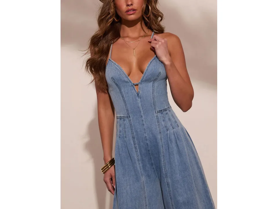 Close-up of the bodice and neckline of the denim jumpsuit.