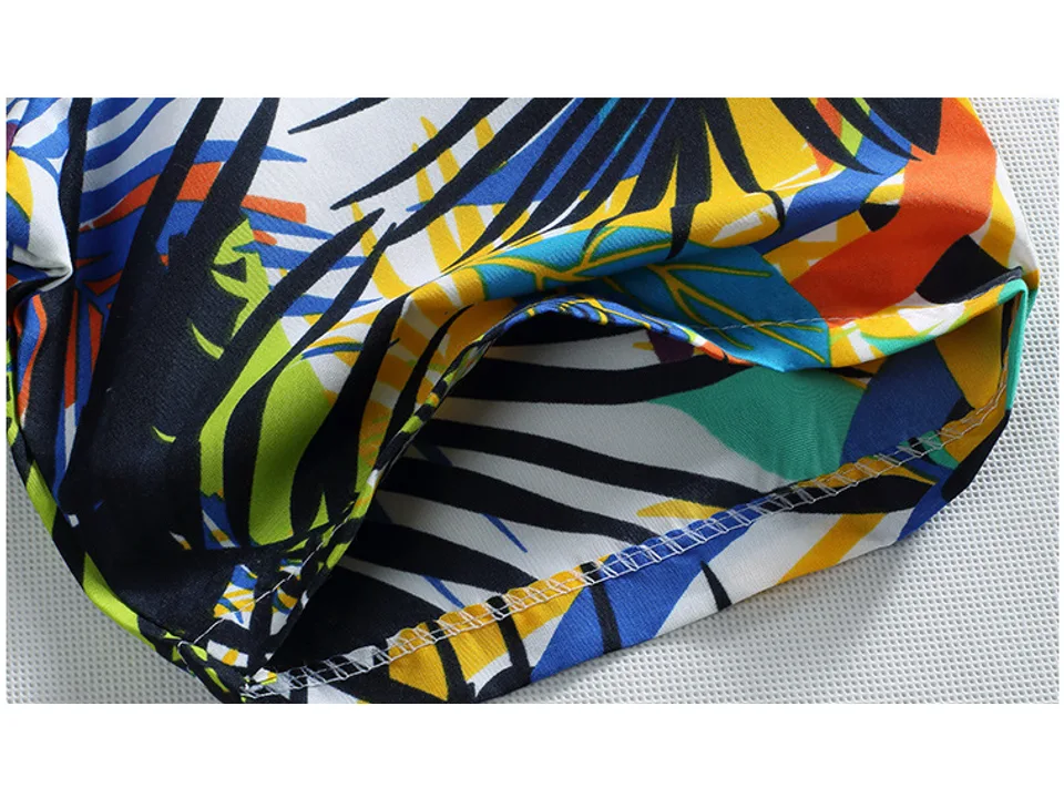 Close-up of the bottom hem and stitching on the shirt.