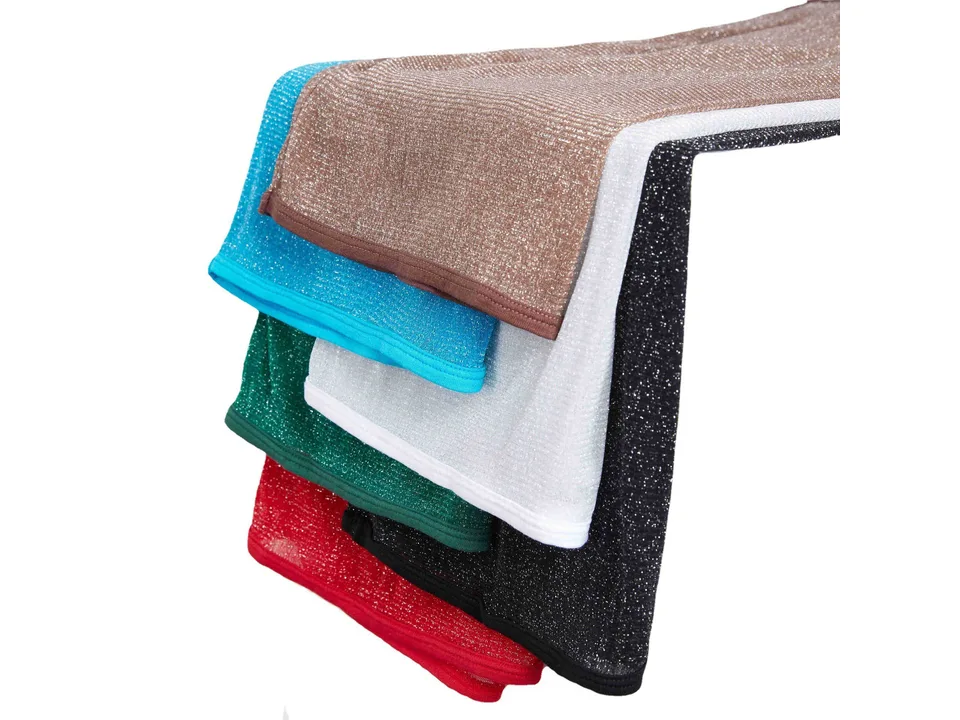 A stack of sleeveless tank tops in various colors.