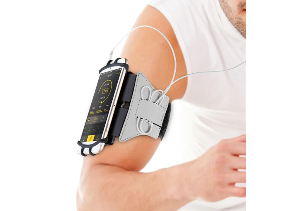 A close-up of a phone armband on an arm with a smartphone attached.