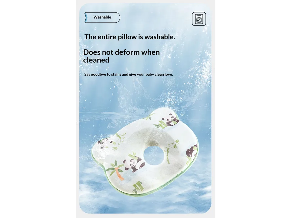 A panda-patterned baby pillow floating in water to demonstrate it is washable.