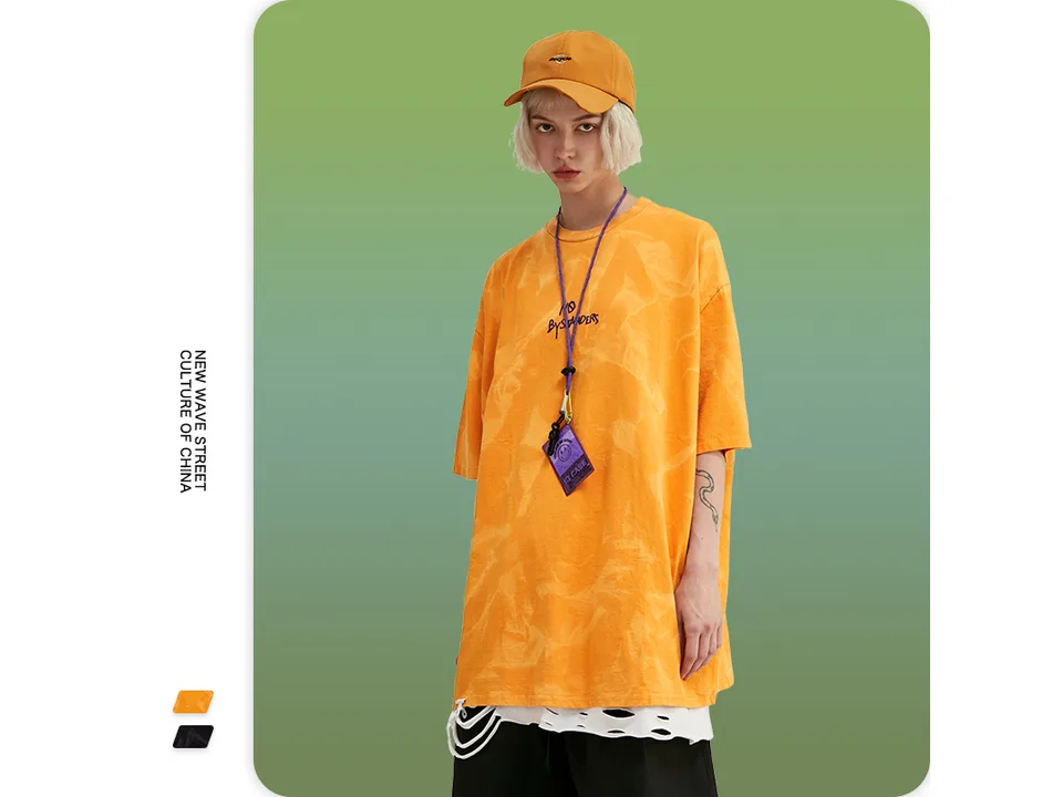 Female model wearing the orange oversized tie-dye t-shirt.