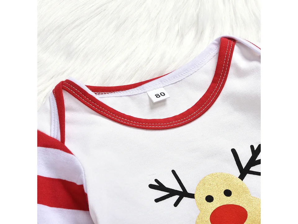 Close-up of the red-trimmed neckline and size 80 tag on the baby bodysuit.