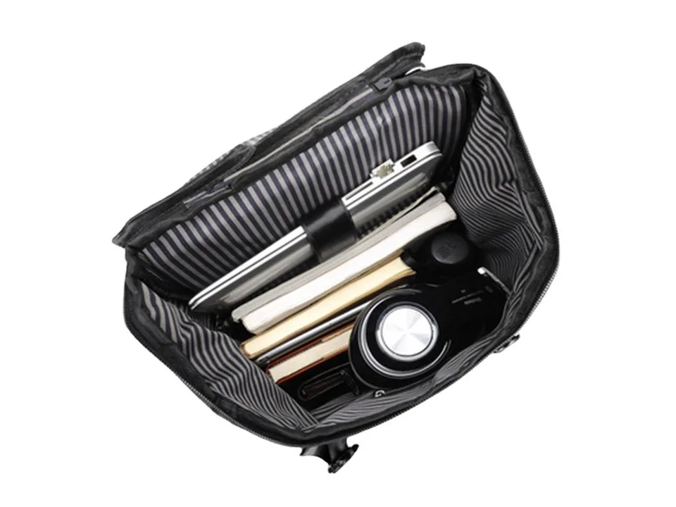 Interior view of the backpack showing organized storage for a laptop and accessories.