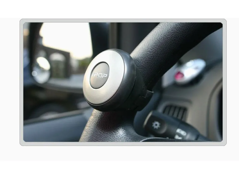 Close-up of the steering wheel spinner knob attached to a steering wheel