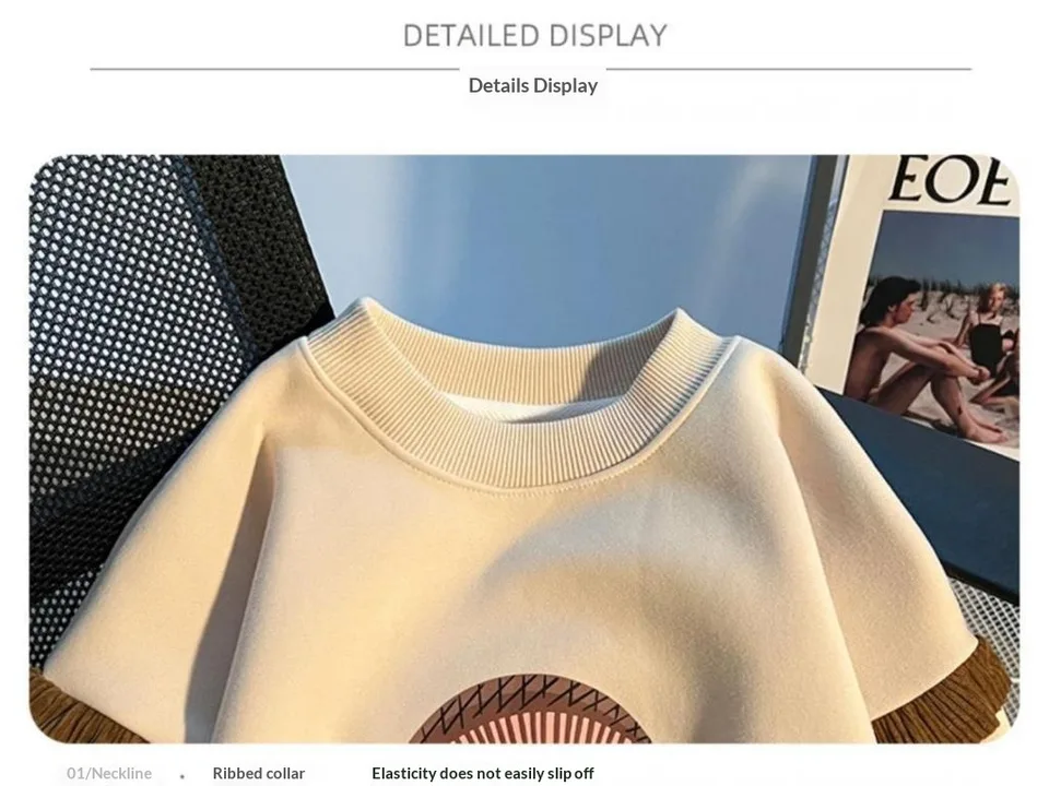 Close-up of the ribbed collar on the beige sweatshirt.