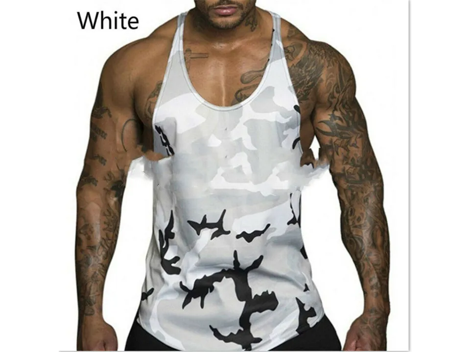 A muscular man wearing a white camouflage tank top.