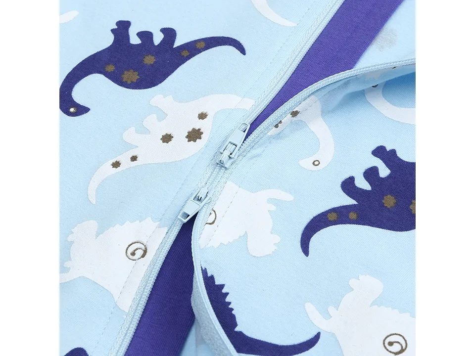 Close-up of the zipper closure on the baby jumpsuit.