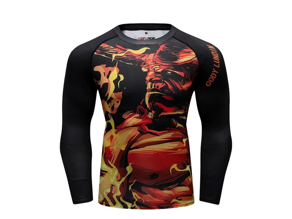 Long-sleeve compression shirt with a fiery demon or monster graphic.