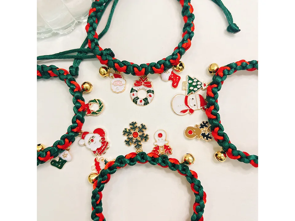Several braided Christmas pet collars with various festive charms like Santa, snowmen, and trees.