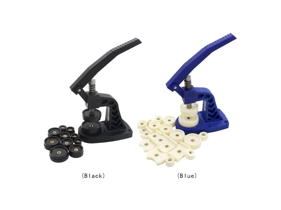 Black and blue watch case press tools with sets of plastic dies.