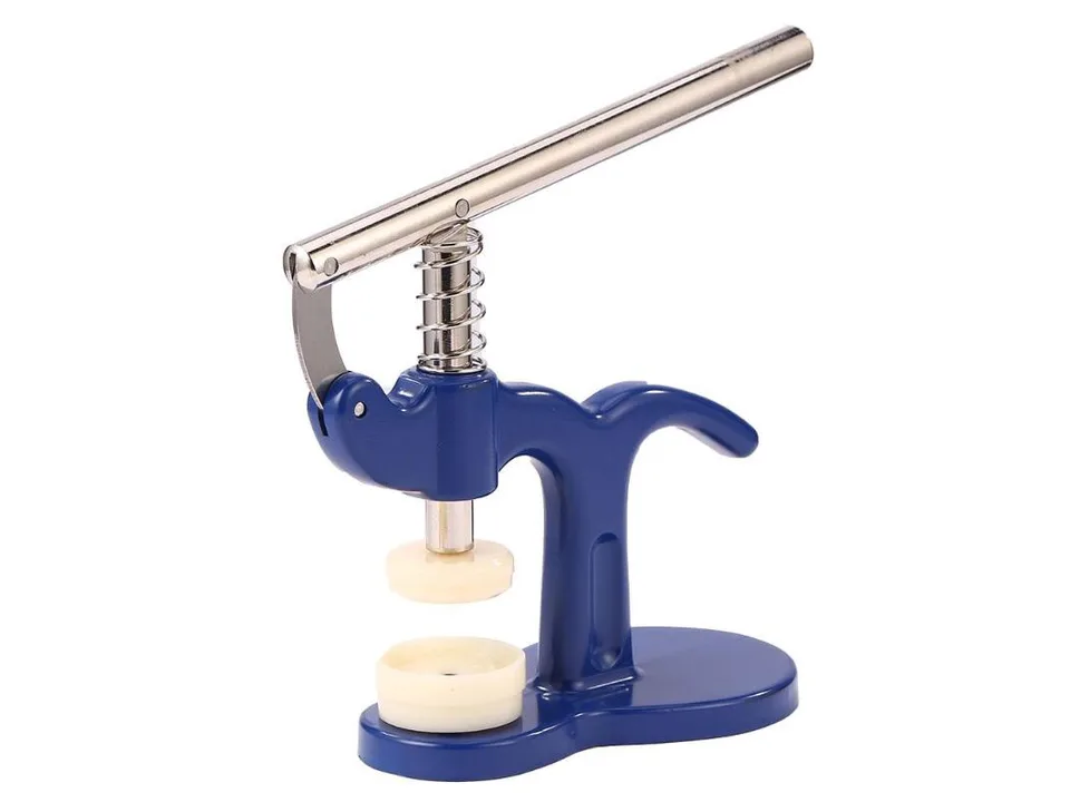 Blue watch case press tool on a white background.