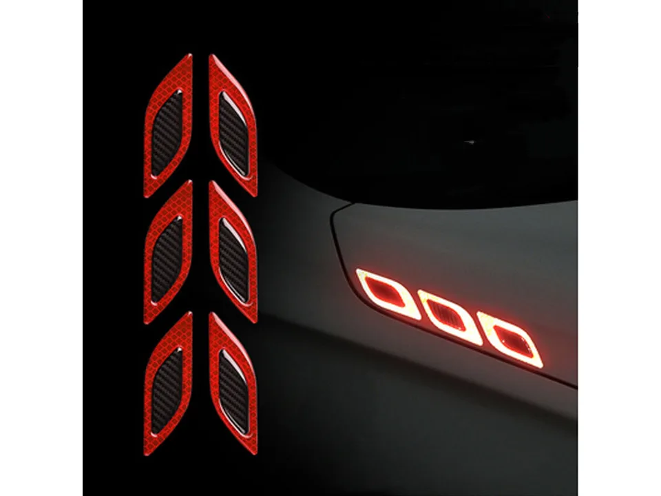 Red reflective car air vent stickers applied to a vehicle body.