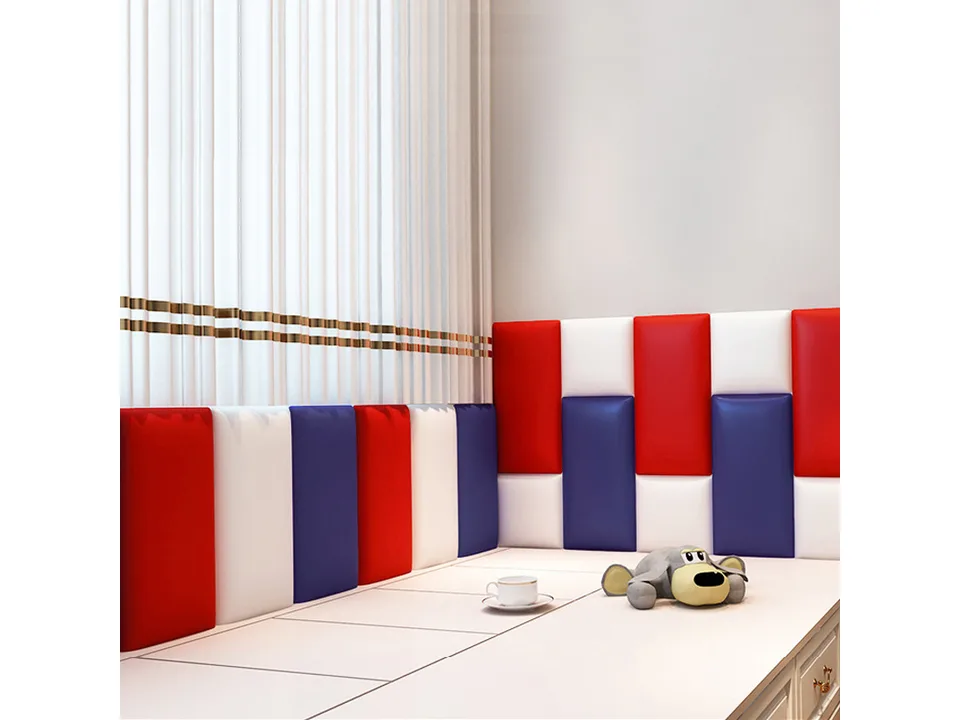 Yellow and beige padded wall panels used as a backrest for a bench seat.