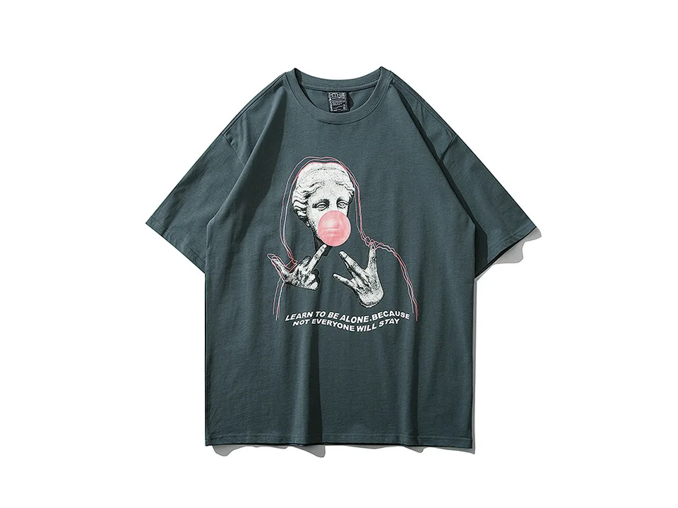 Front view of a grey t-shirt featuring a graphic of a statue blowing a bubblegum bubble.