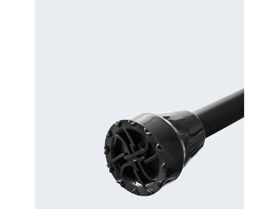 Close-up of the black rubber tip of the crutch with a textured, non-slip base.