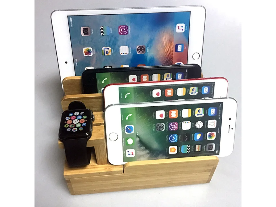 Bamboo charging station holding a tablet, two smartphones, and an Apple Watch.