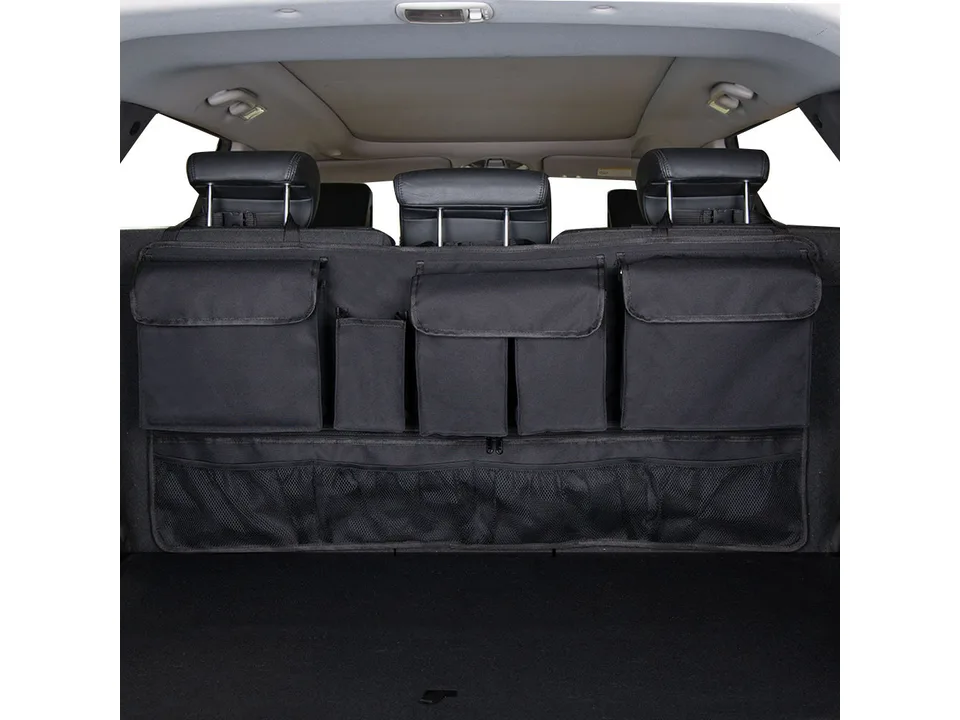 Black car trunk organizer hanging on the back of rear seats.