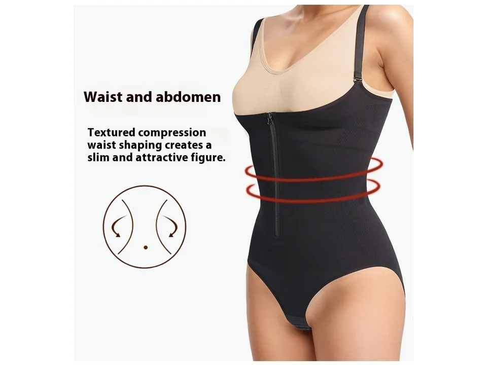 A woman wearing the black strapless shapewear bodysuit, highlighting waist and abdomen compression.