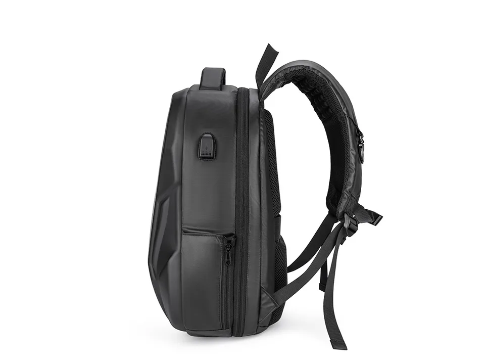 Side view of the black hard shell backpack showing the USB charging port.