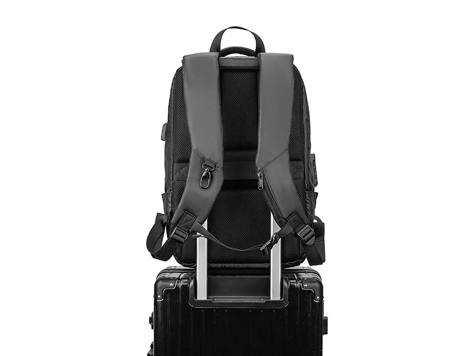 Back view of the backpack showing the luggage strap and shoulder straps.