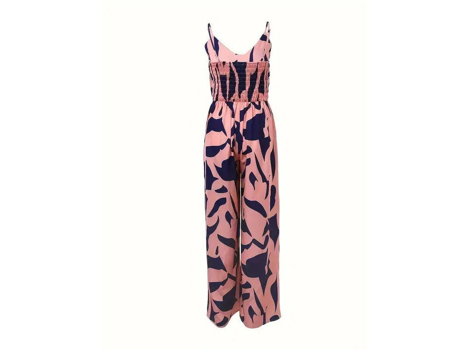 Back view of the pink and navy blue patterned jumpsuit showing the smocked bodice.