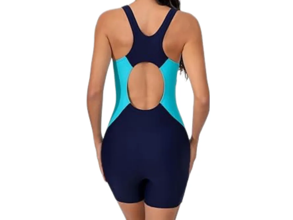Back view of a woman wearing a blue one-piece capri swimsuit with a racerback design.