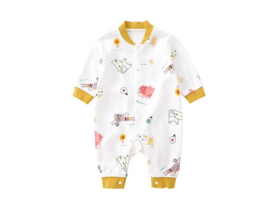 White baby jumpsuit with a cat pattern.