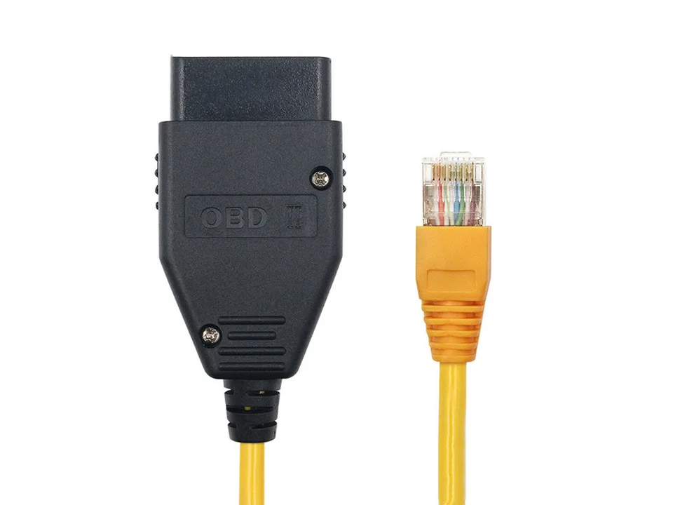 Close-up of the OBD2 connector and the Ethernet plug side by side.