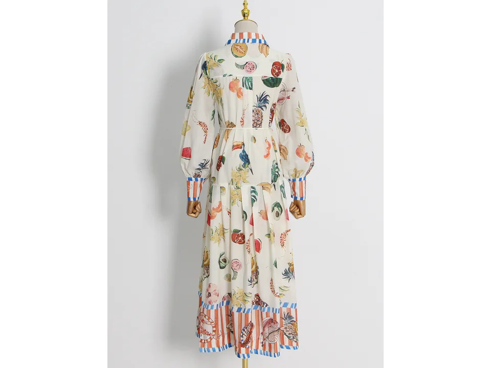 Back view of the fruit print maxi shirt dress on a mannequin.