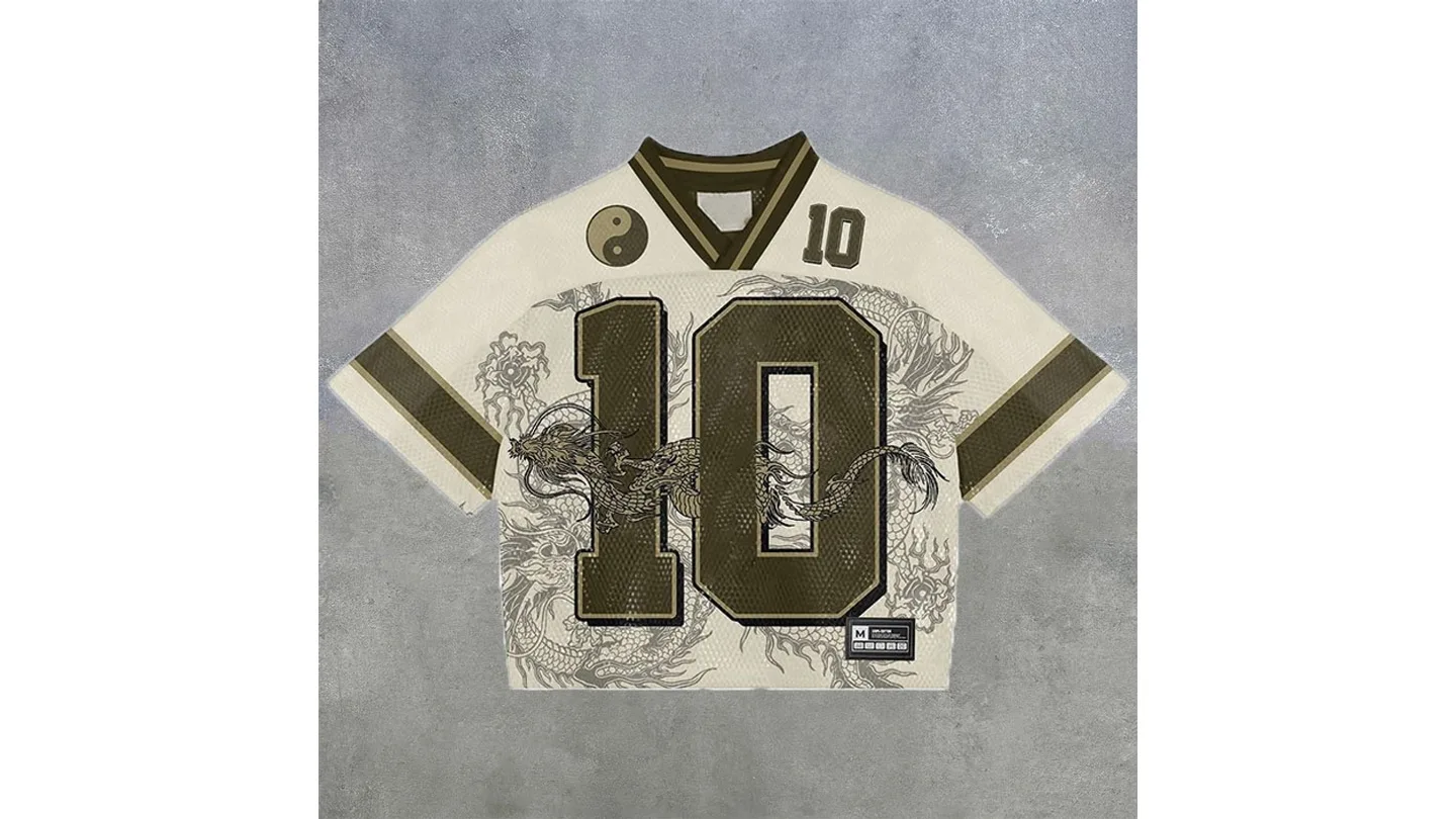 A beige V-neck sports t-shirt with a large number 10, dragon print, and yin-yang symbol.