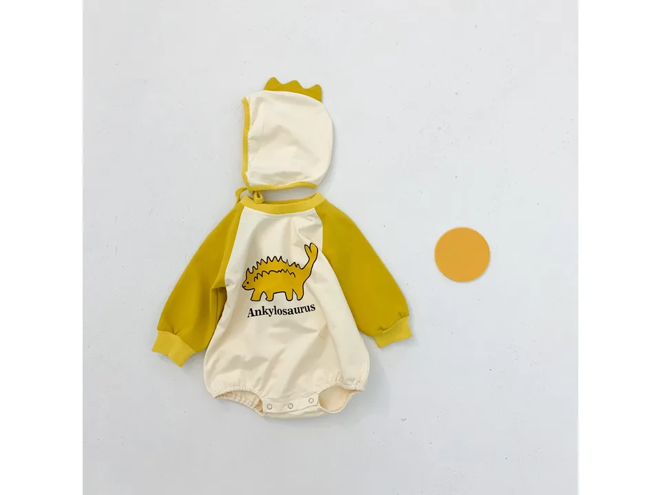 Yellow baby jumpsuit with an Ankylosaurus print and a matching hood.