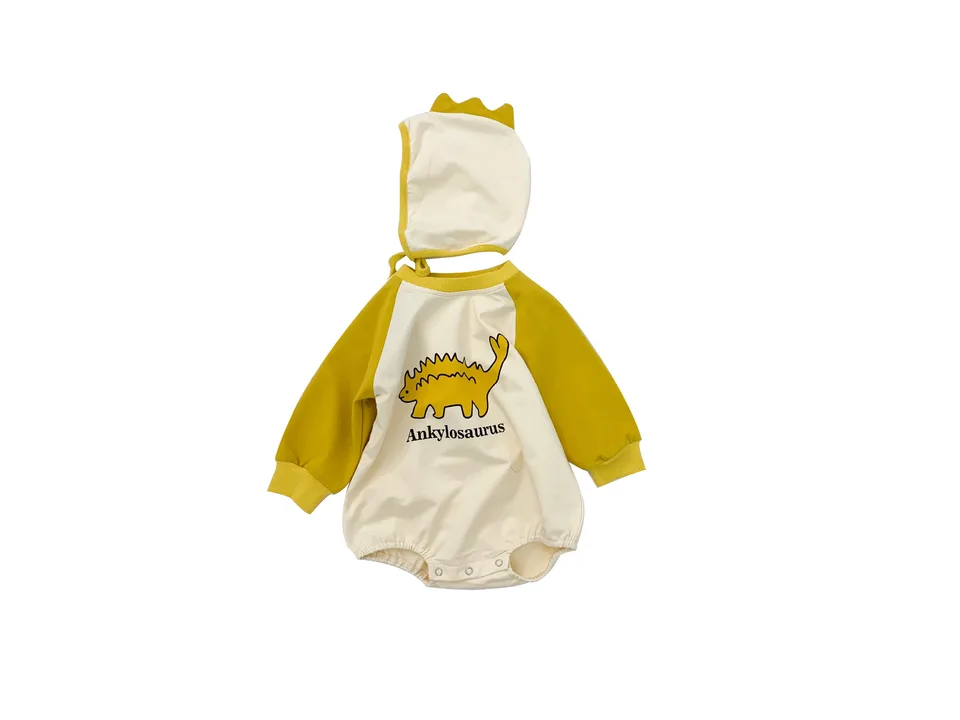 Yellow baby jumpsuit with an Ankylosaurus print and a matching hood.