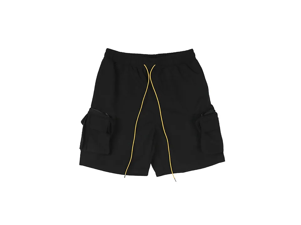 Black cargo shorts with side pockets and yellow drawstring on a white background.