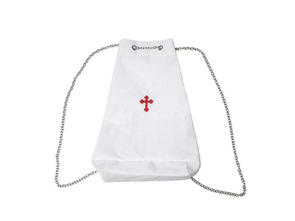 White drawstring bag with a red cross embroidery and silver chain straps.