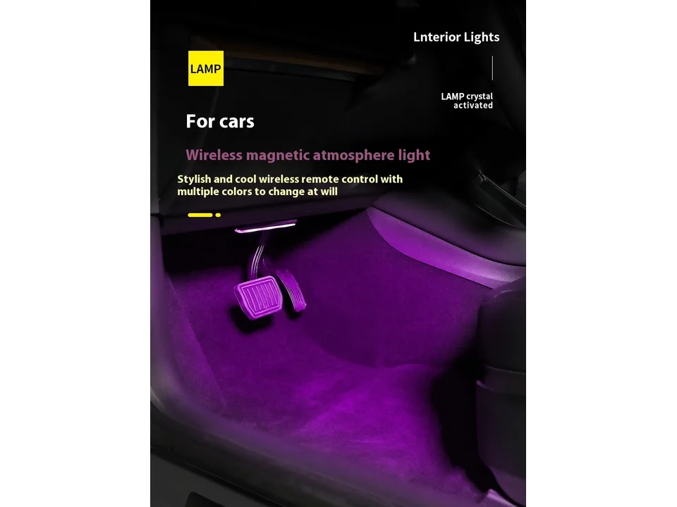 Wireless magnetic LED atmosphere light installed in a car footwell, glowing purple.