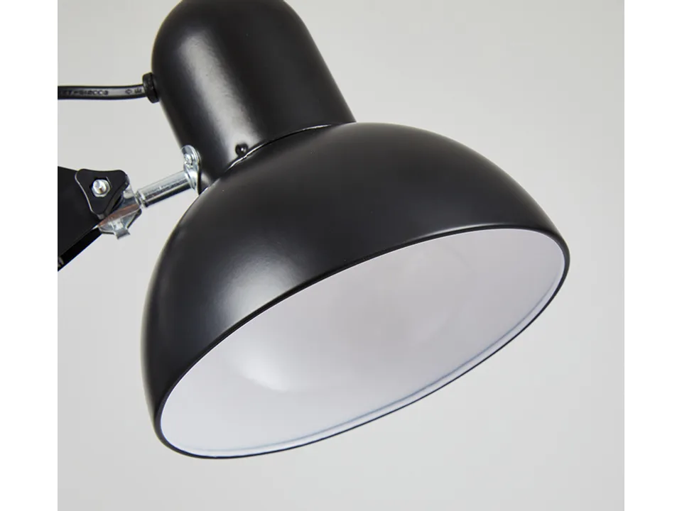 Close-up view of the black desk lamp shade.