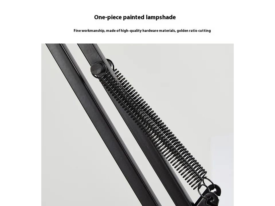 Close-up of the black metal swing arm and tension spring mechanism.
