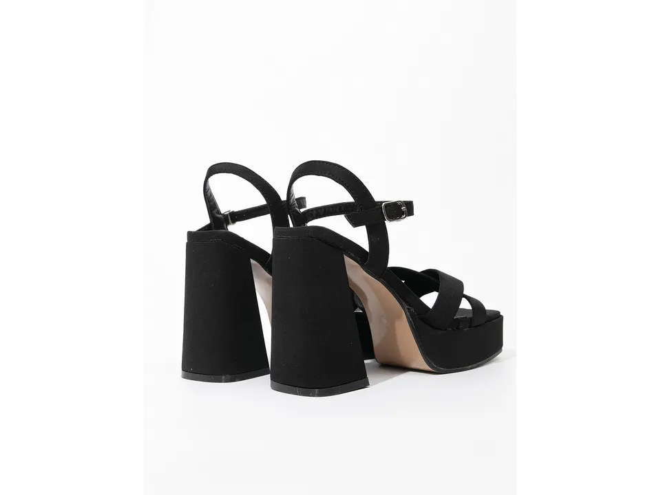 Rear view of the black platform sandals showing the chunky heel and ankle strap.