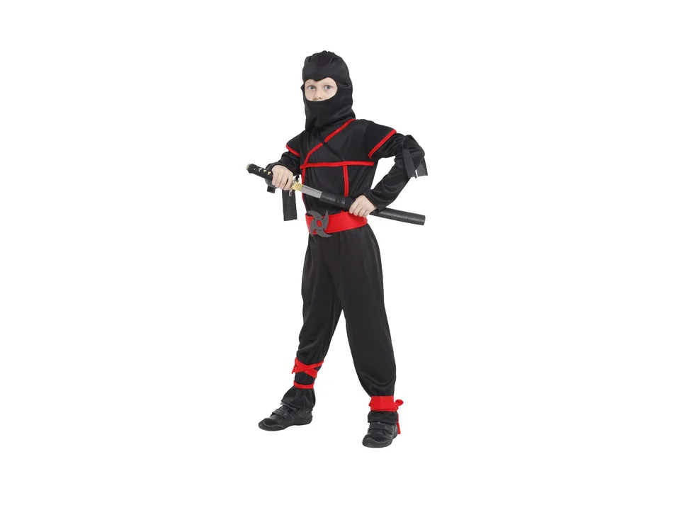 A child wearing a black and red ninja costume with a hood and holding a toy sword.