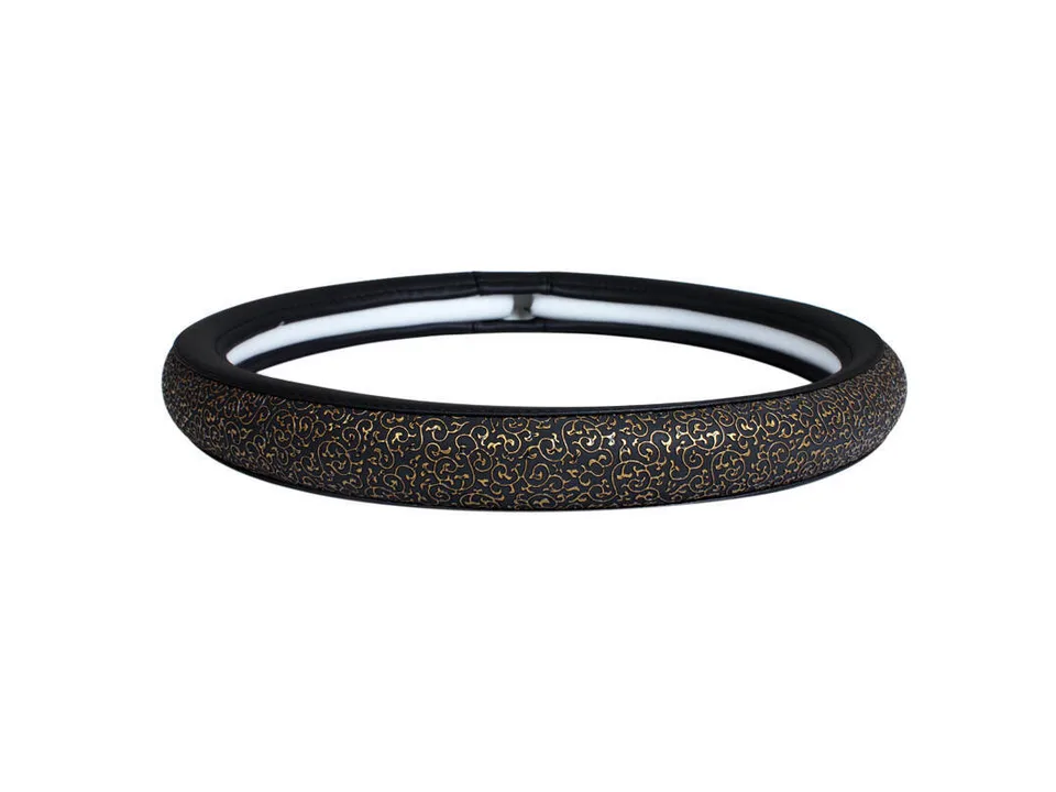 A black steering wheel cover with a gold swirl pattern on a white background.