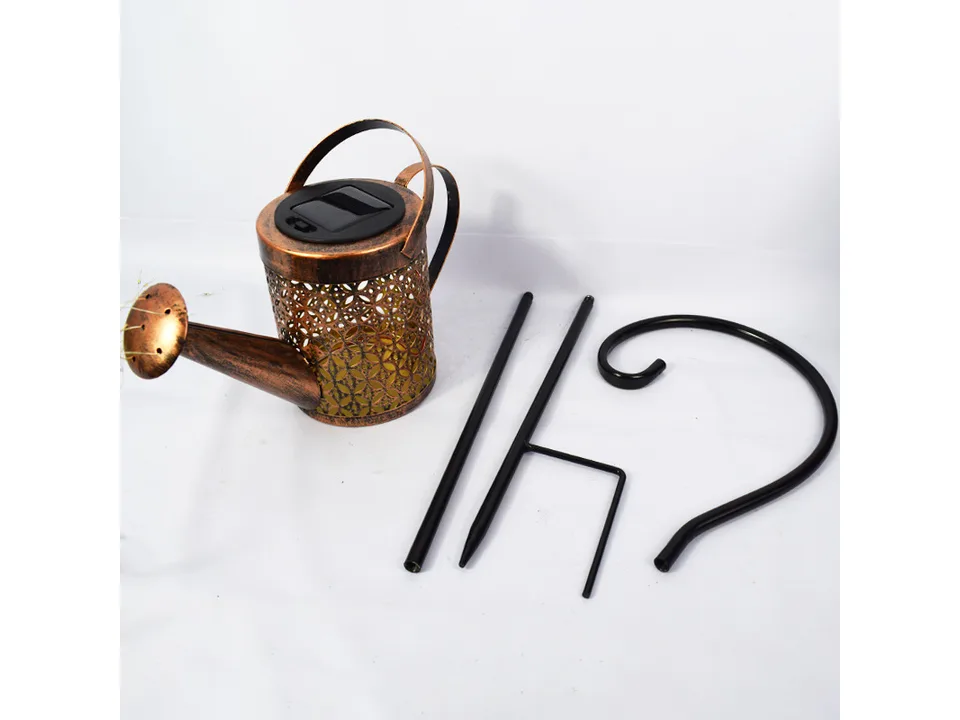The watering can light, shepherd's hook, and ground stake laid out on a white background.