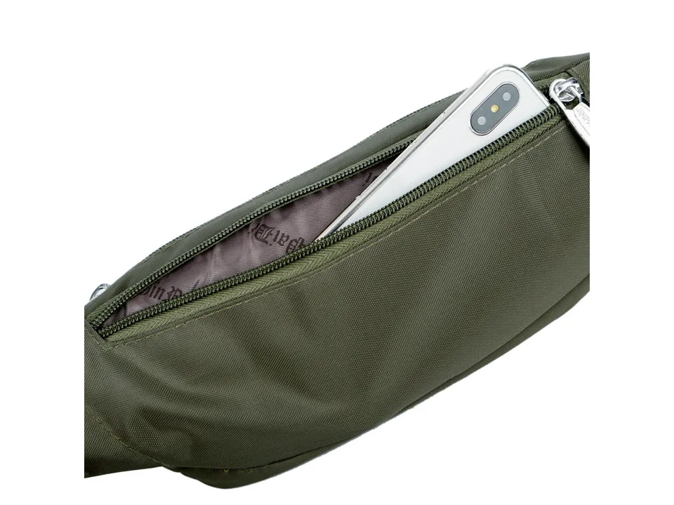 Close-up of the waist bag's front zipper pocket with a smartphone partially inserted.