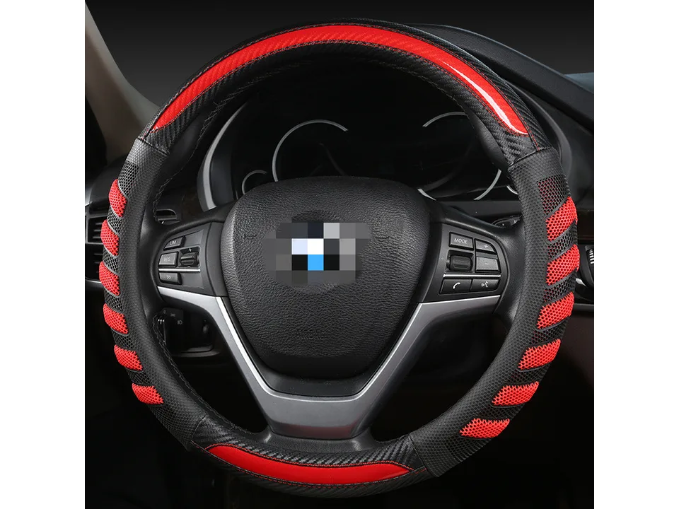 Red and black honeycomb steering wheel cover installed on a car steering wheel.