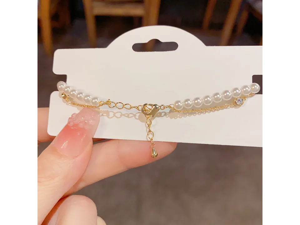 Close-up of the bracelet's clasp and adjustable extension chain.