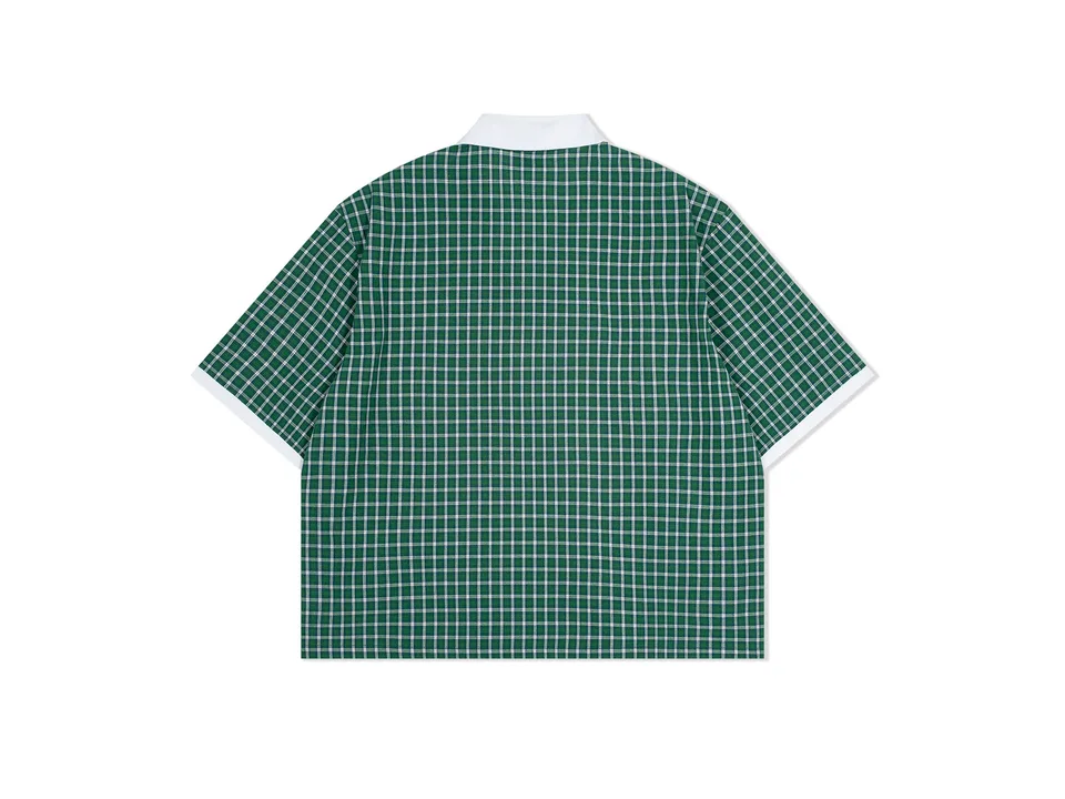 Green plaid short-sleeve polo shirt with a white collar, flat view.