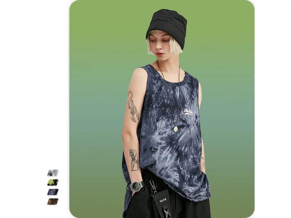Model wearing a blue tie-dye tank top with a bucket hat.