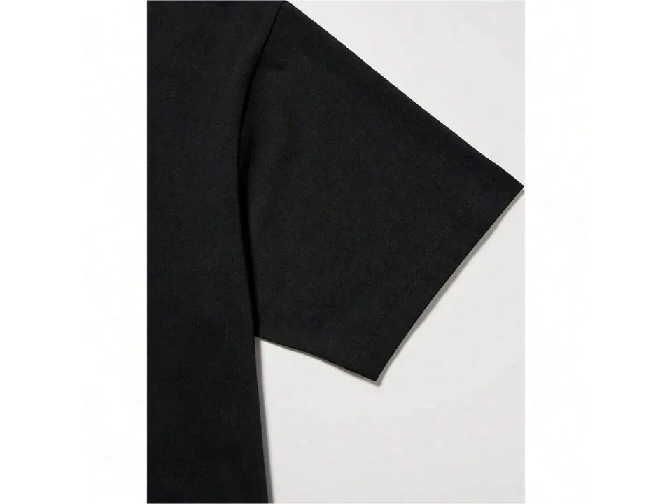 Close-up of the black t-shirt sleeve and fabric texture