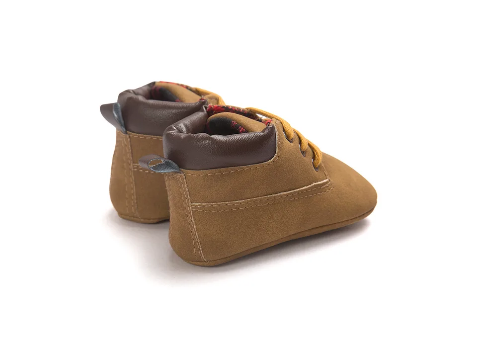 Rear view of the brown baby high-top shoes showing the heel and collar.
