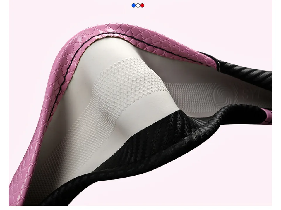 Close-up of the pink and black carbon fiber texture steering wheel cover material.